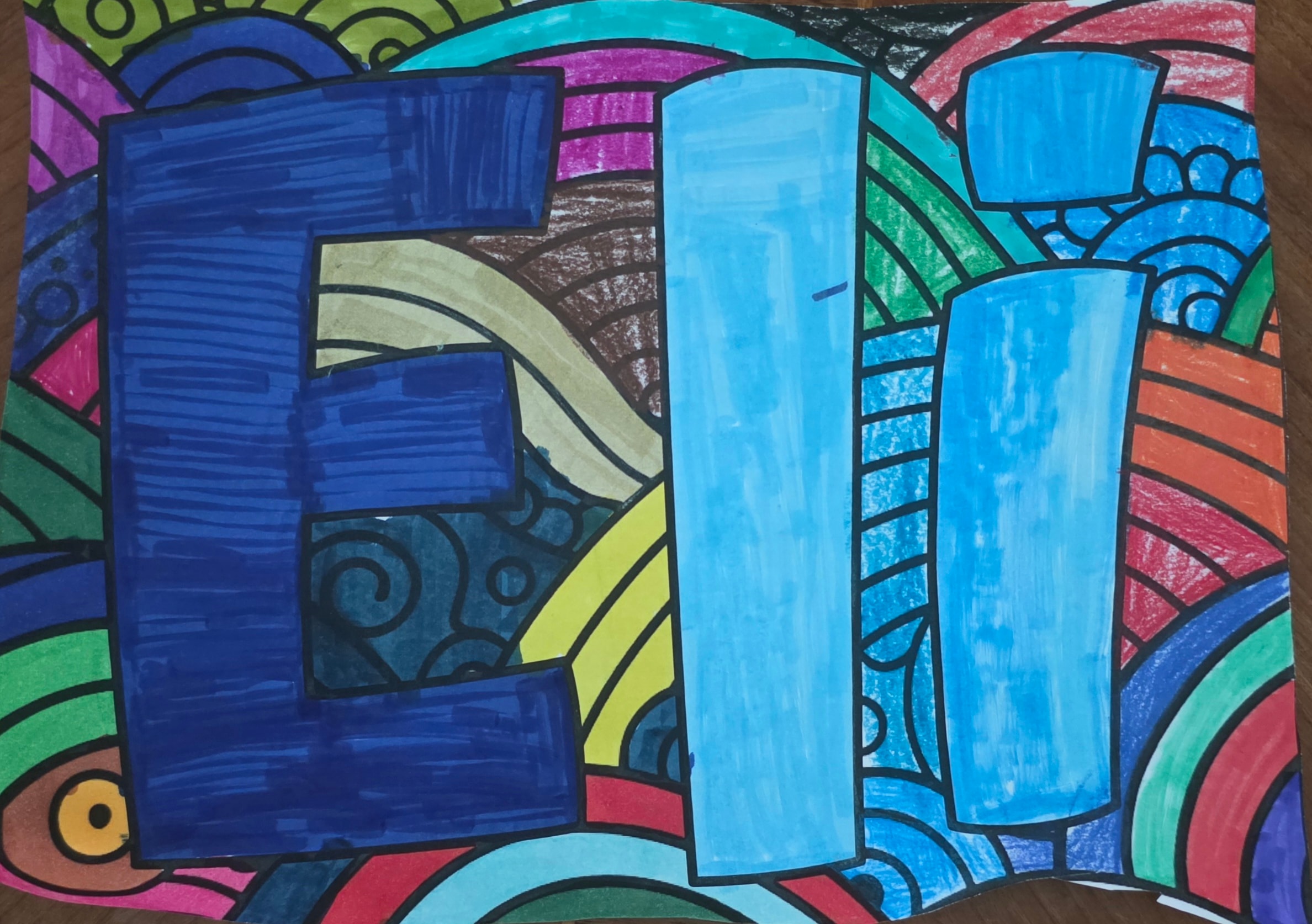 Eli's name art — colorful stained-glass style letters spelling ELI